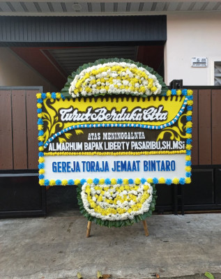 Papan Bunga Duka di Kalome